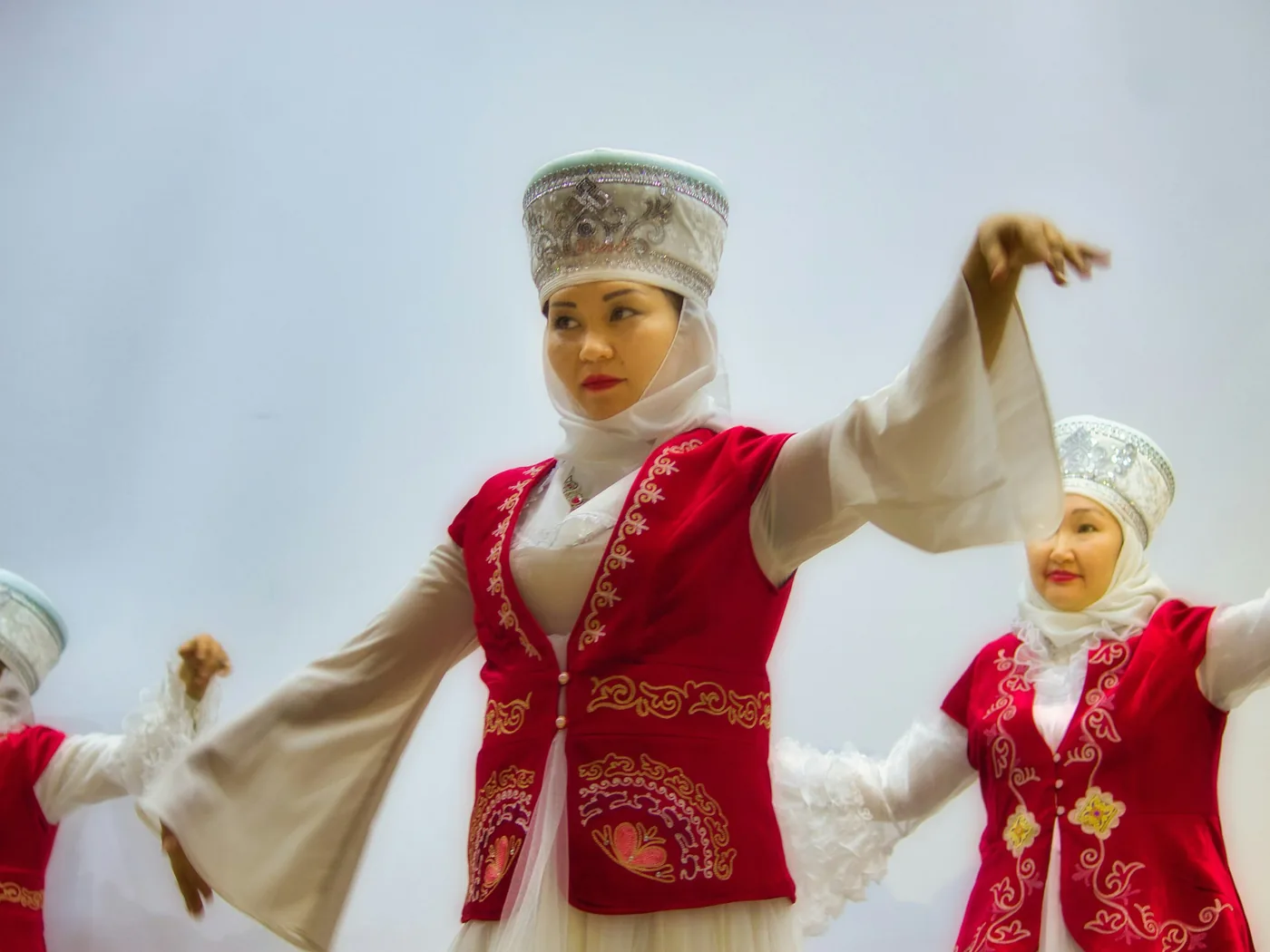 Folk dancers in traditional dress performing at a Turkish Night show